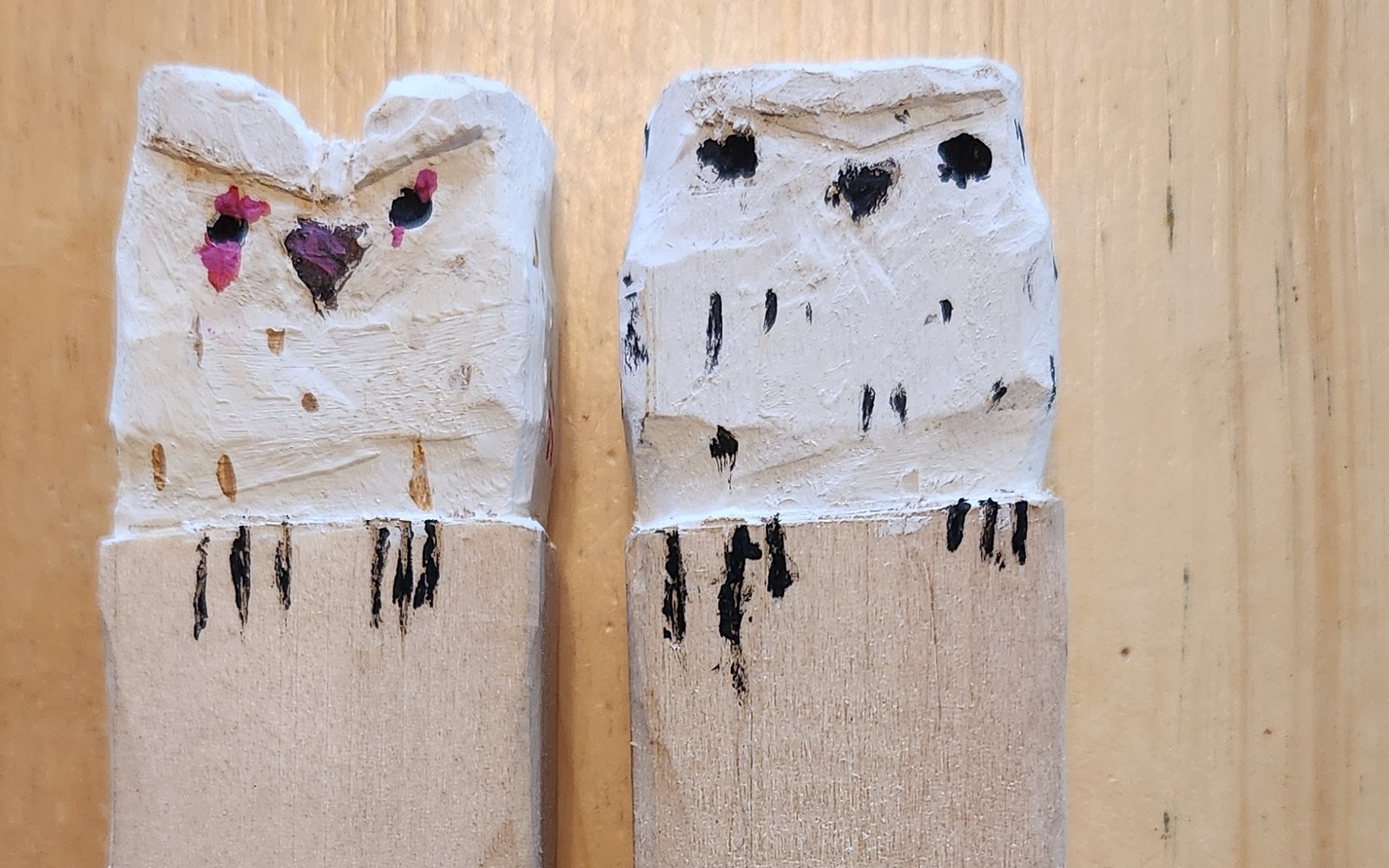 Pair of small hand-whittled and painted wooden owls